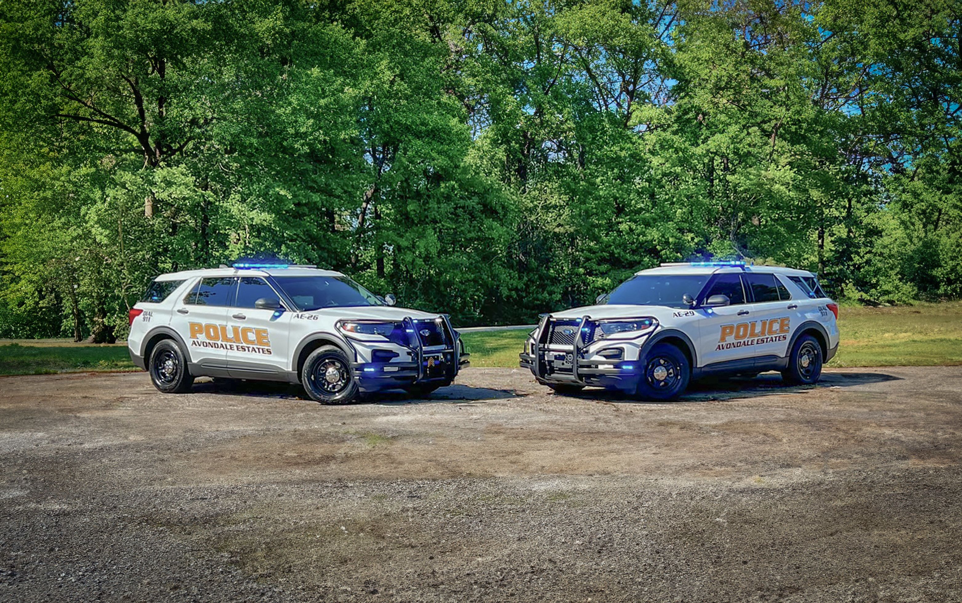 Two Avondale Estates Police Interceptor® Utility SUVs parked side by side